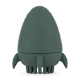 PETITE&MARS Hračka silikonová do vody s kartáčkem Splashy Rocket Misty Green 6m+